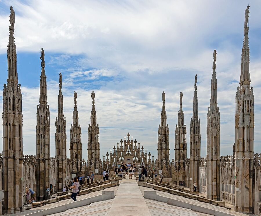 Milan Duomo rooftop walkway between Gothic spires