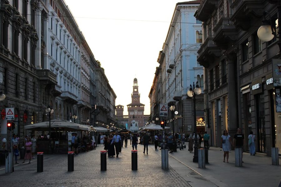 Piazza Castello Milan in the evening with people walking