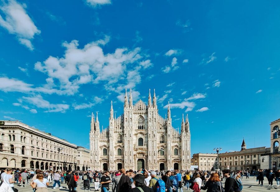 Piazza Duomo Milan with crowds on a sunny day