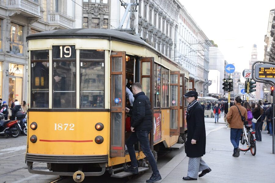 Yellow tram on the streets of Milan