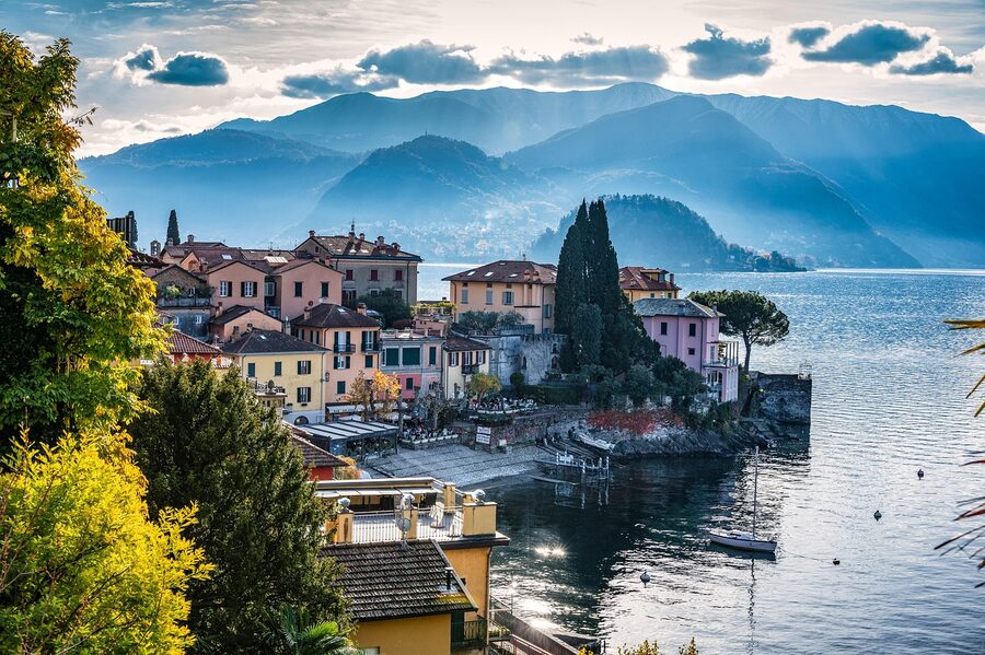Varenna harbor on Lake Como with stacked houses and mountains