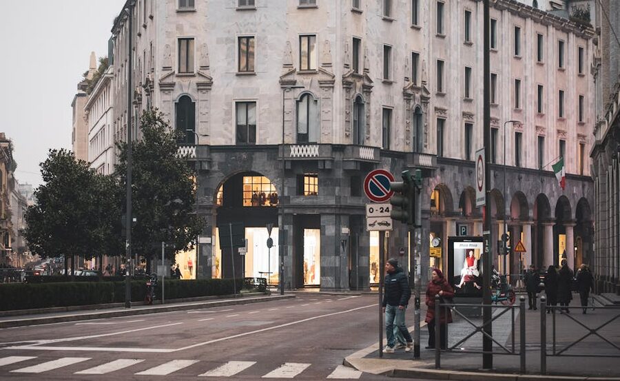 Historic street in central Milan with classical architecture