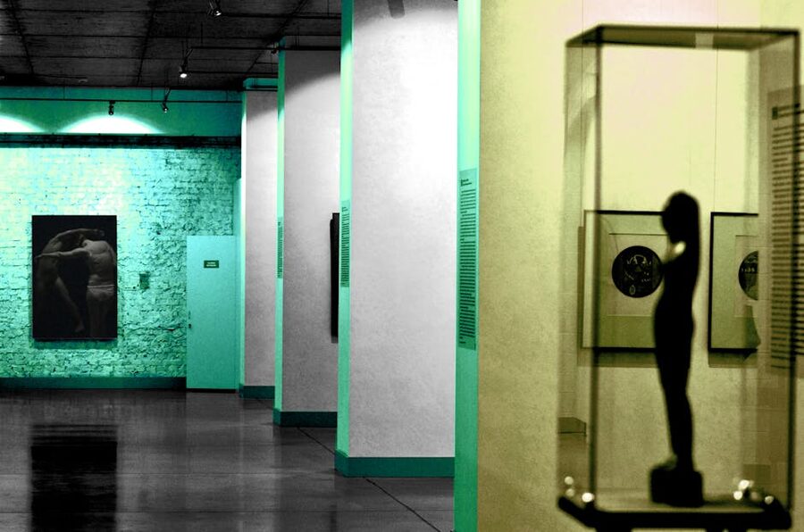 Modern art gallery with sculptures and ambient light