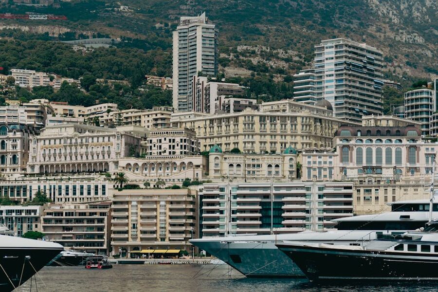 Monaco harbour with luxury yachts and surrounding cityscape