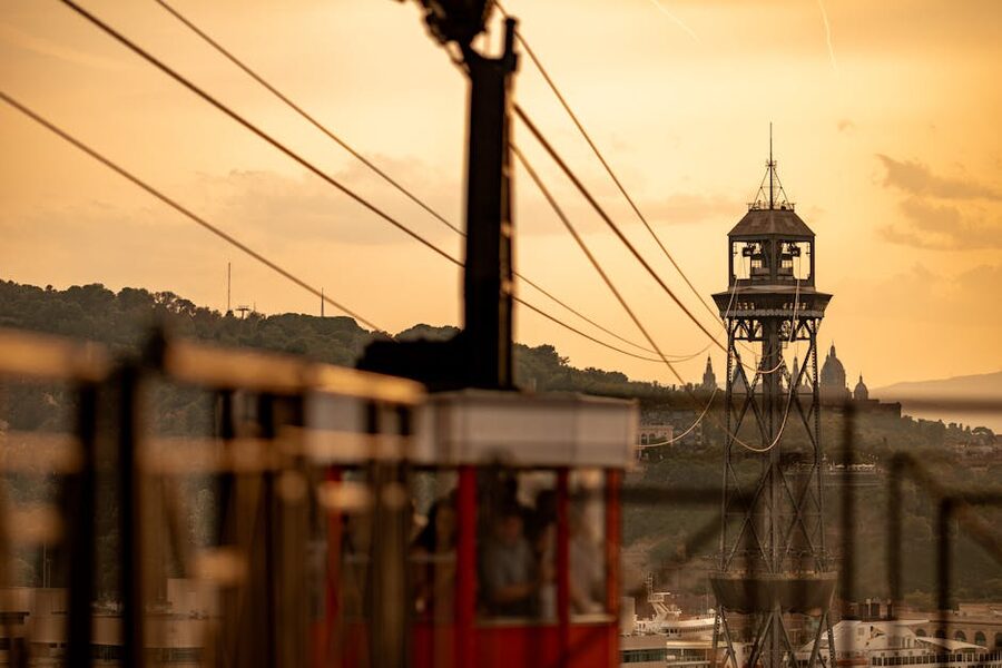 Cable car cabin and Barcelona at sunset from Montjuic