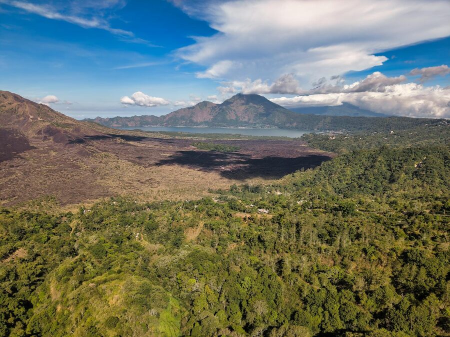 Aerial view of Mount Batur and its caldera in Bali at golden hour