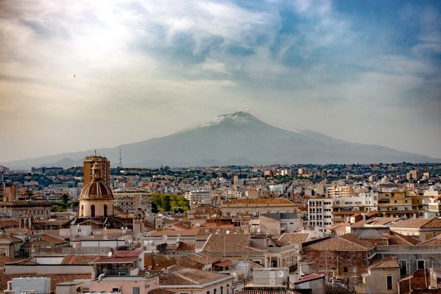 Catania cityscape with Mount Etna in the background