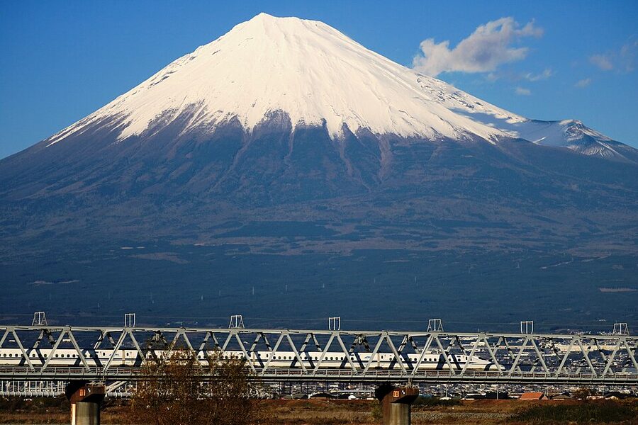 N700 Shinkansen crossing the Fujikawa Bridge with Mount Fuji in the background