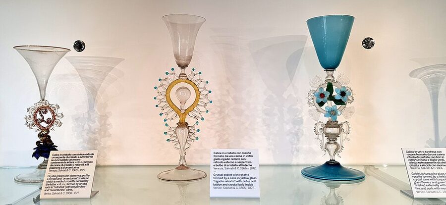 Glass display at the Museo del Vetro in Murano showing historic Venetian glass