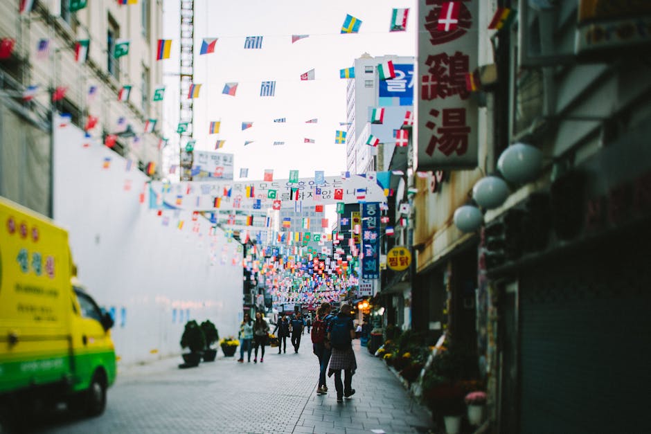 Namdaemun Market flags and crowd in Seoul