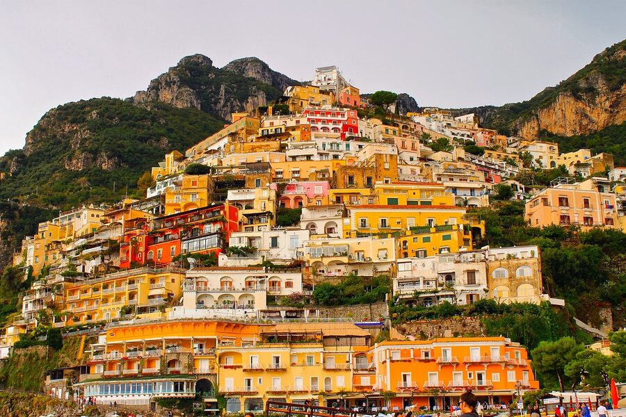 Colorful houses stacked on the Positano hillside