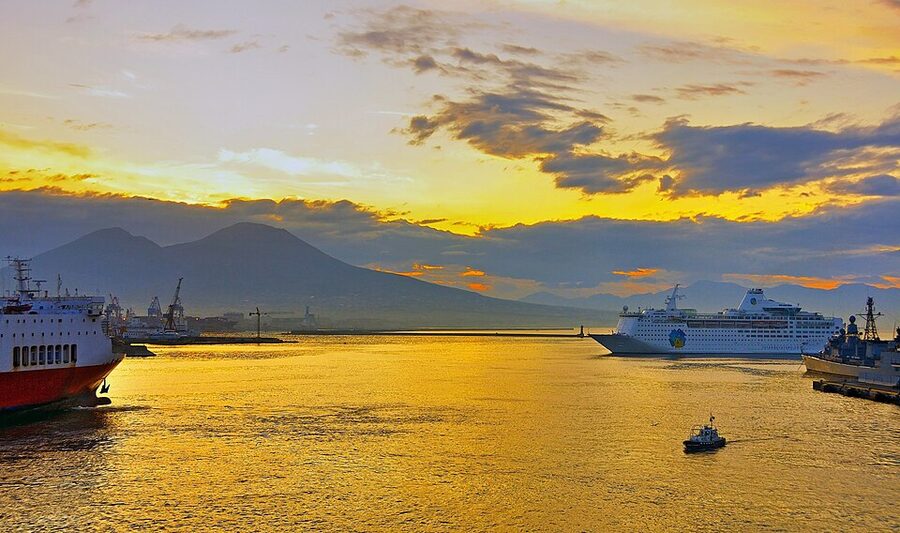 Naples harbor with Mount Vesuvius at dawn