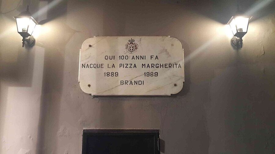 Plaque commemorating the invention of Pizza Margherita at Brandi Naples