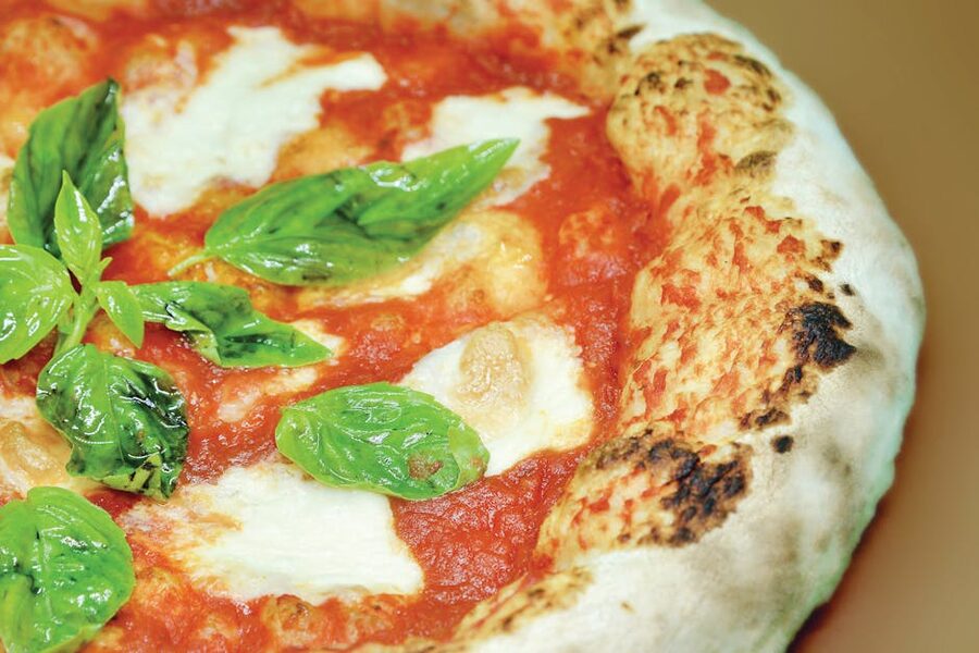 Naples pizza with mozzarella and basil