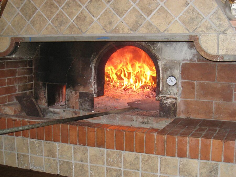 Traditional pizza oven with fire