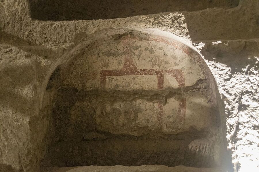 Long vaulted corridor inside the Catacombs of San Gennaro