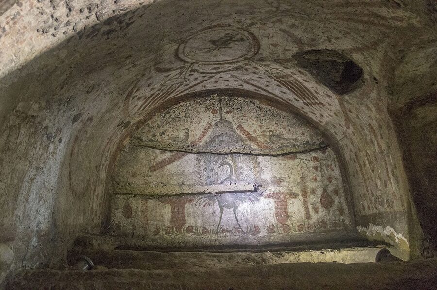 Decorated arcosolium with painted ceiling inside Catacombs of San Gennaro