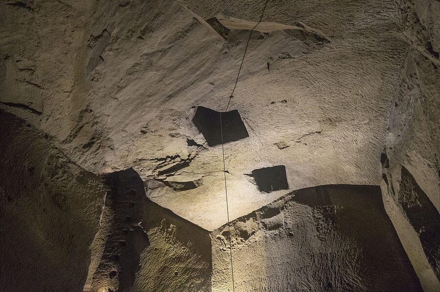Tour group walking through Naples Underground
