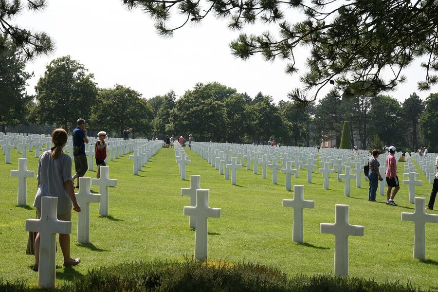 Single white cross at the American cemetery in Normandy