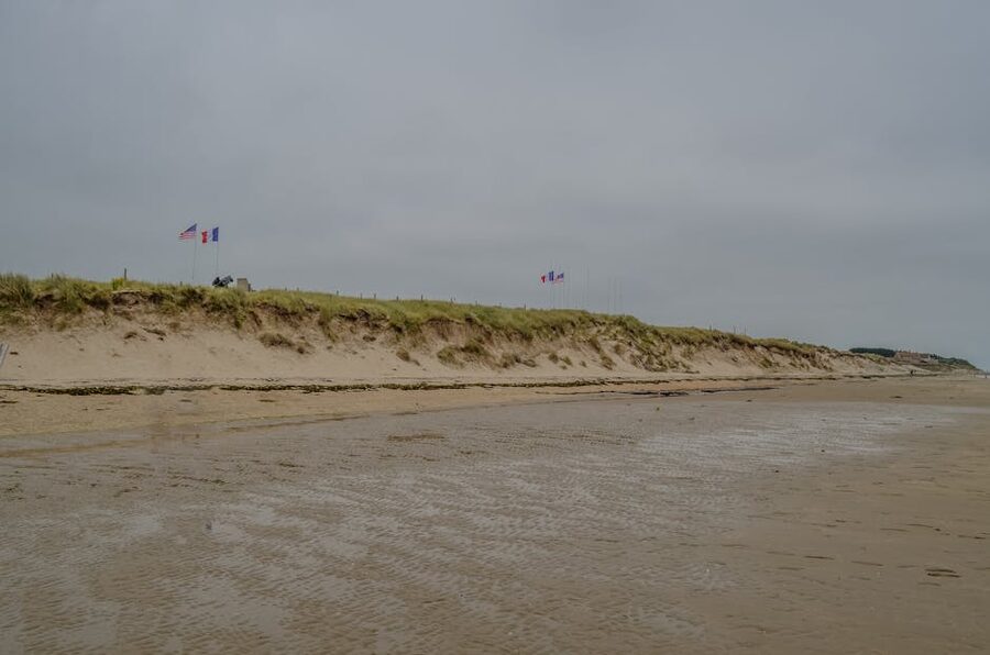 Utah Beach with American and French flags