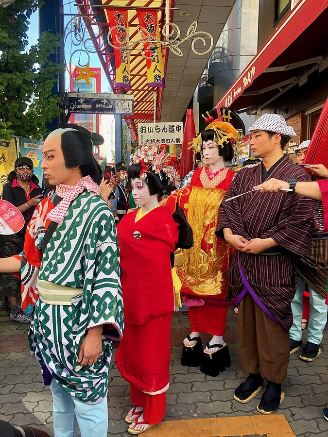 Modern oiran parade procession in Japan with elaborate costumes