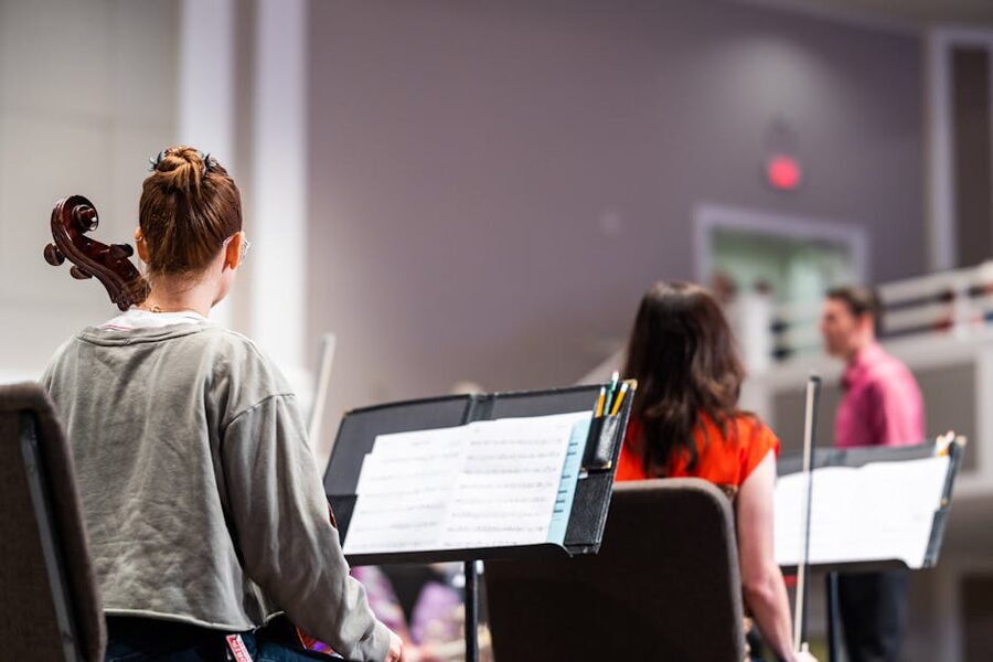 Orchestra rehearsal symphony strings cellist