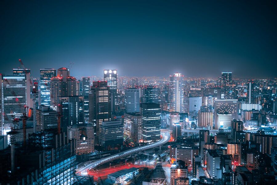 Aerial view of Osaka at night with skyscrapers