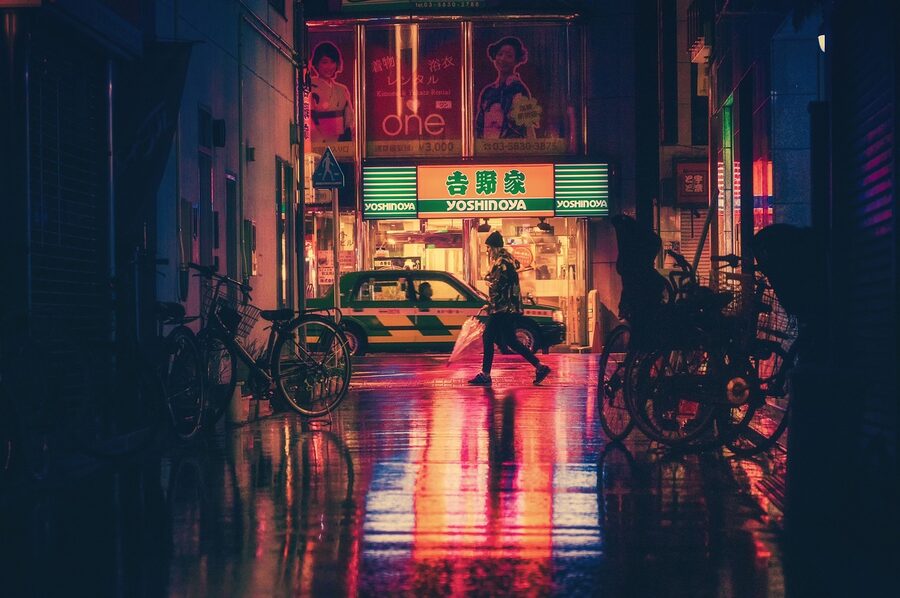 Osaka alley at night with neon glow