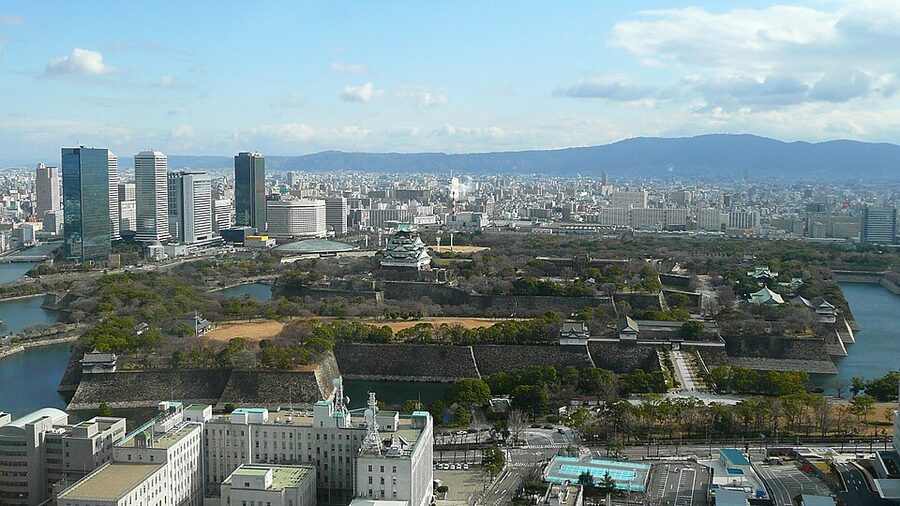 Path through Osaka Castle Park with surrounding greenery