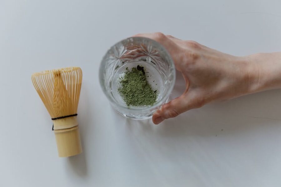Top view of matcha powder with whisk at Osaka class
