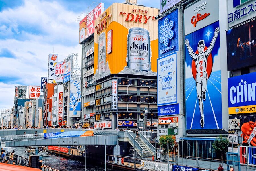 Colorful Dotonbori signage and canal reflection Osaka