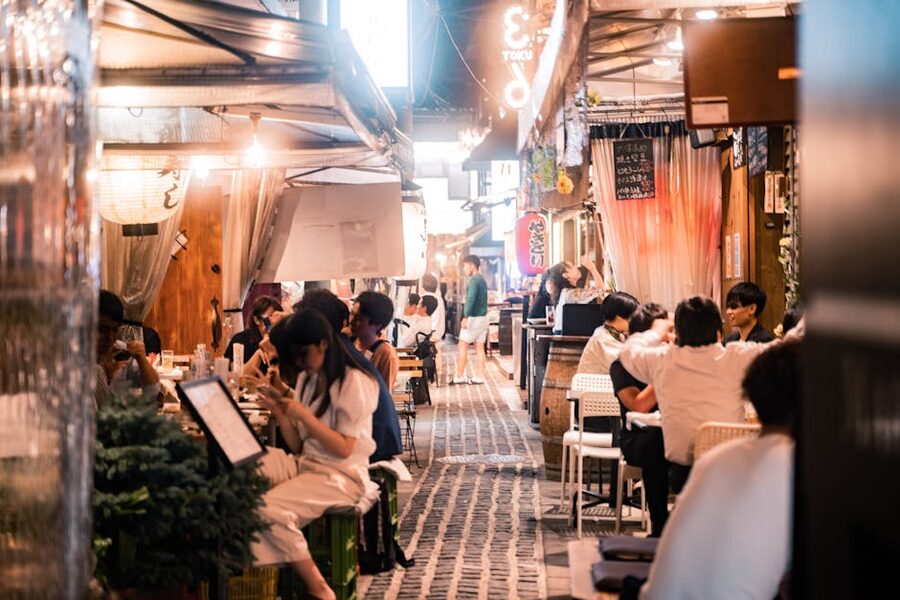 Osaka alleyway dining with lanterns at night