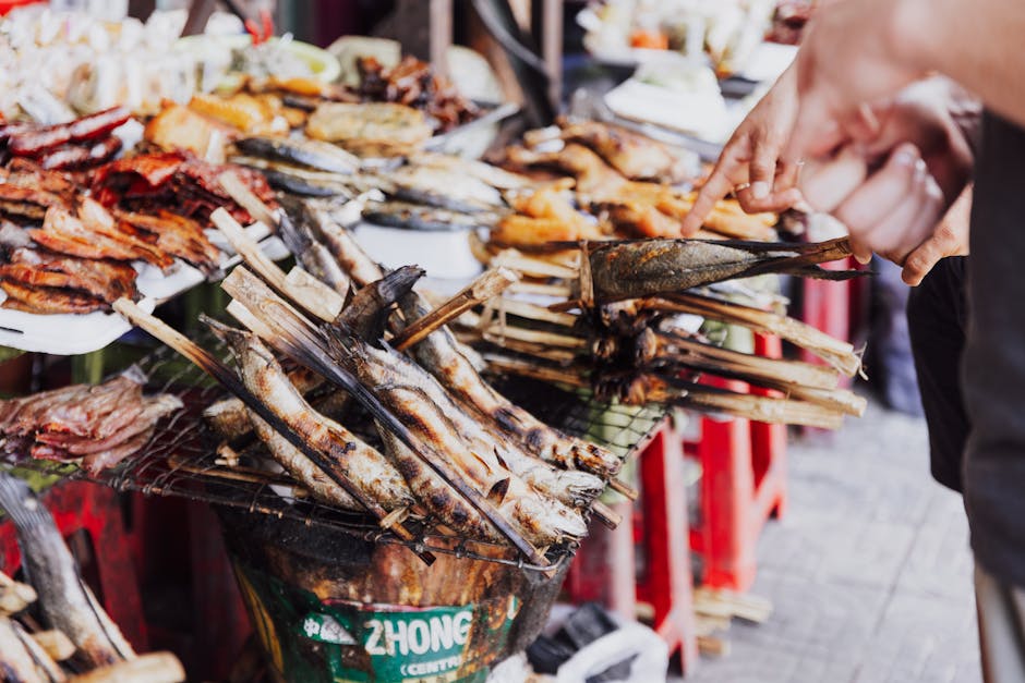 Grilled fish and meats at a Cambodian market food stall