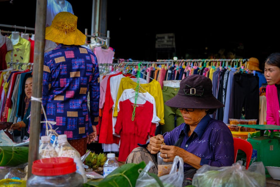 Busy Siem Reap local market with vendors and shoppers