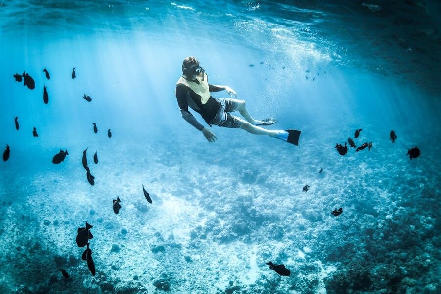 Snorkeler in clear blue Mediterranean water