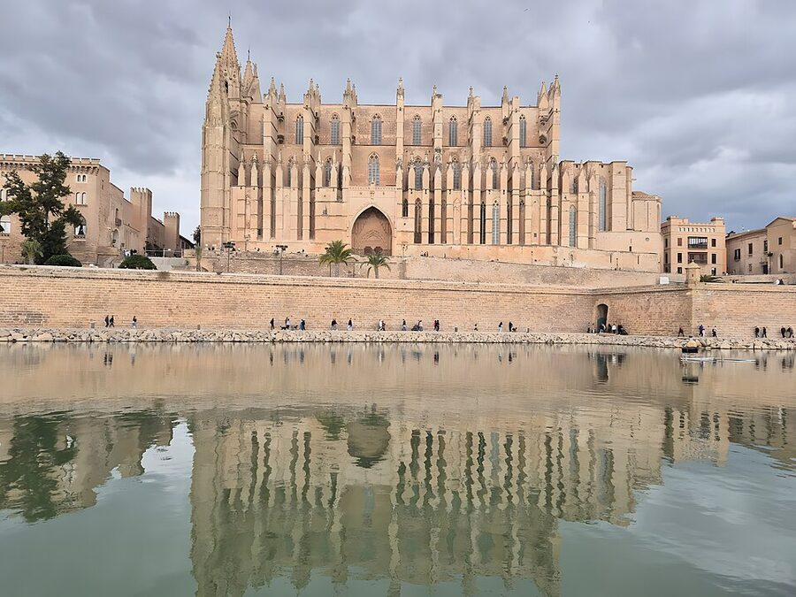 Palma Cathedral La Seu reflected in the pool at Parc de la Mar in Mallorca