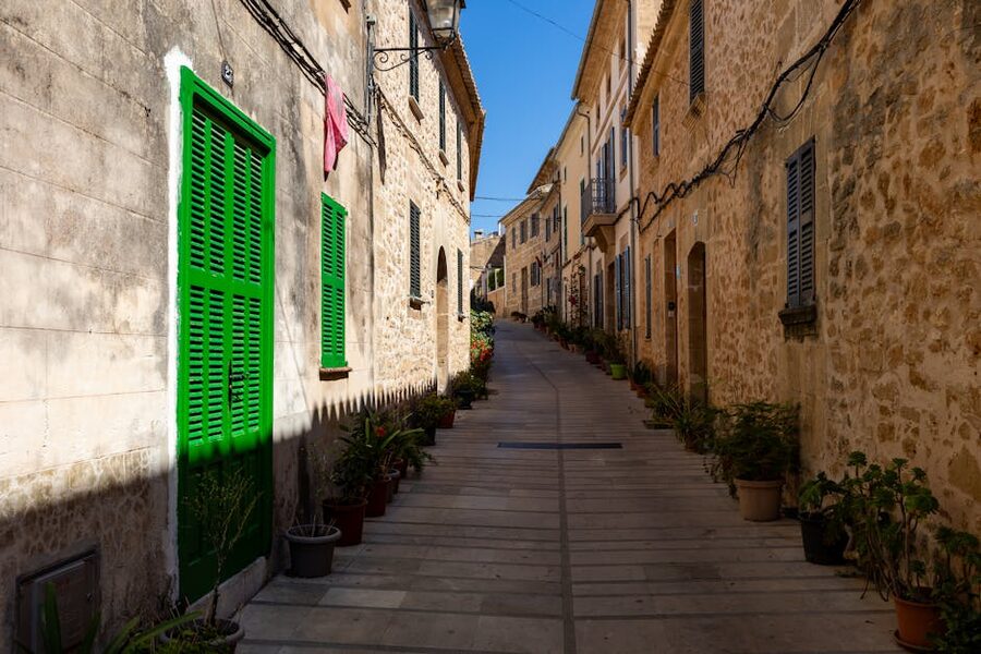 Palma de Mallorca old town stone houses with green shutters