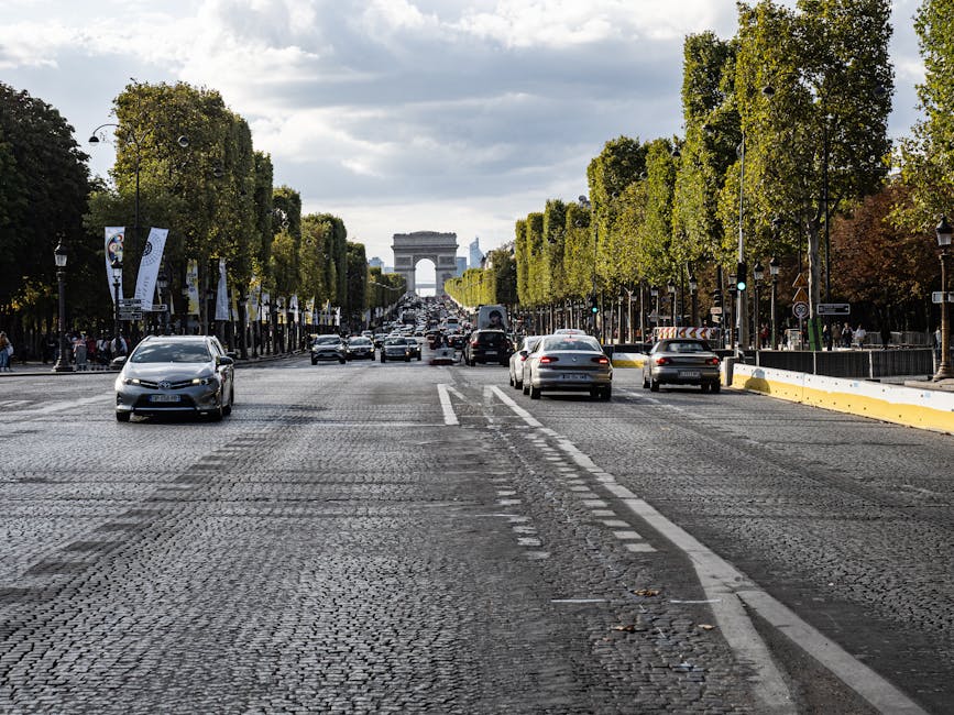 Walking down the Champs-Elysees toward the Arc de Triomphe