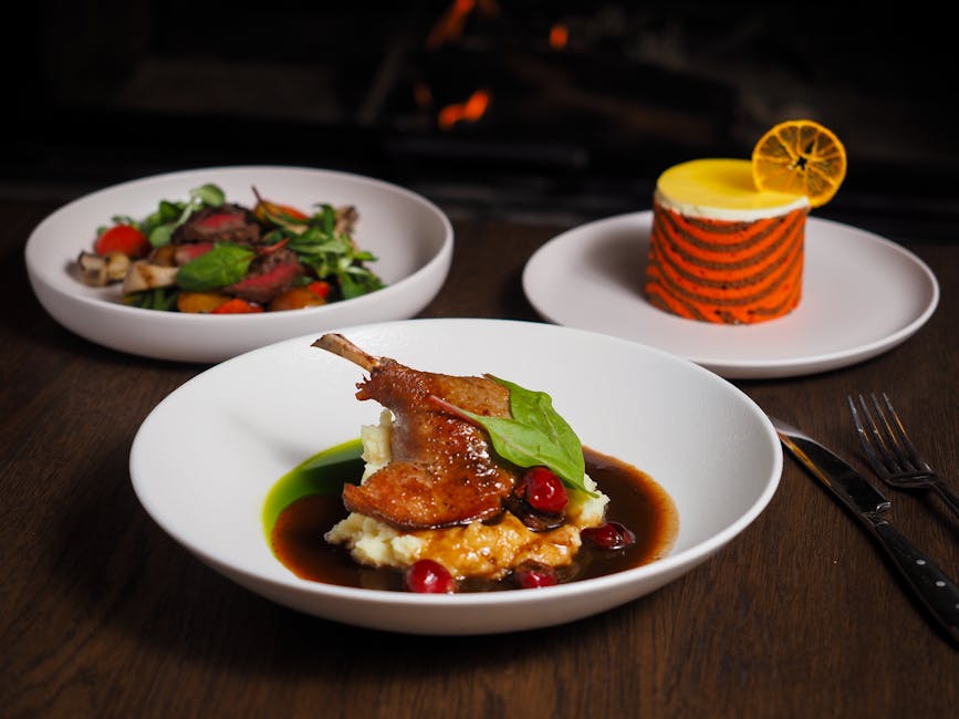Elegant three-course gourmet meal plated on white china