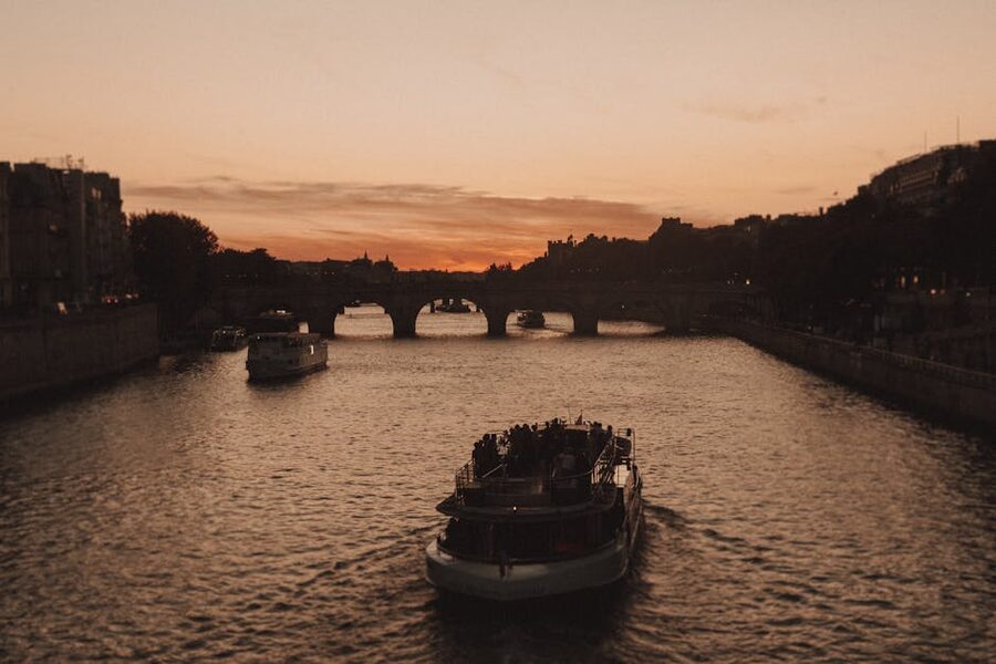 Sunset cruise scene on the Seine River in Paris