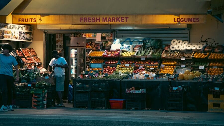Paris fresh market display fruit and vegetables at night