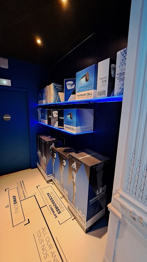 Themed exhibit room with branded display boxes at Musee Grevin Paris