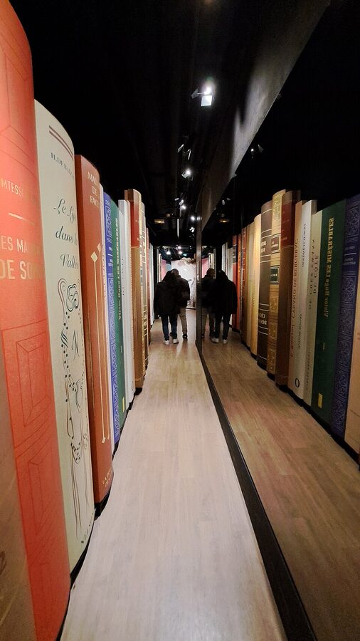 Giant book sculpture corridor between rooms at Musee Grevin Paris