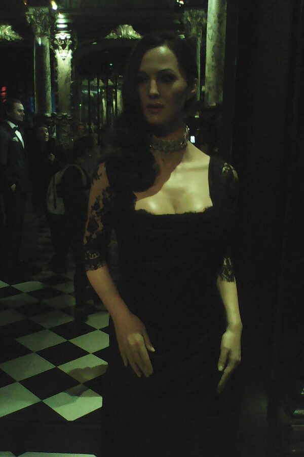 Monica Bellucci wax figure in black lace dress at Musee Grevin Paris