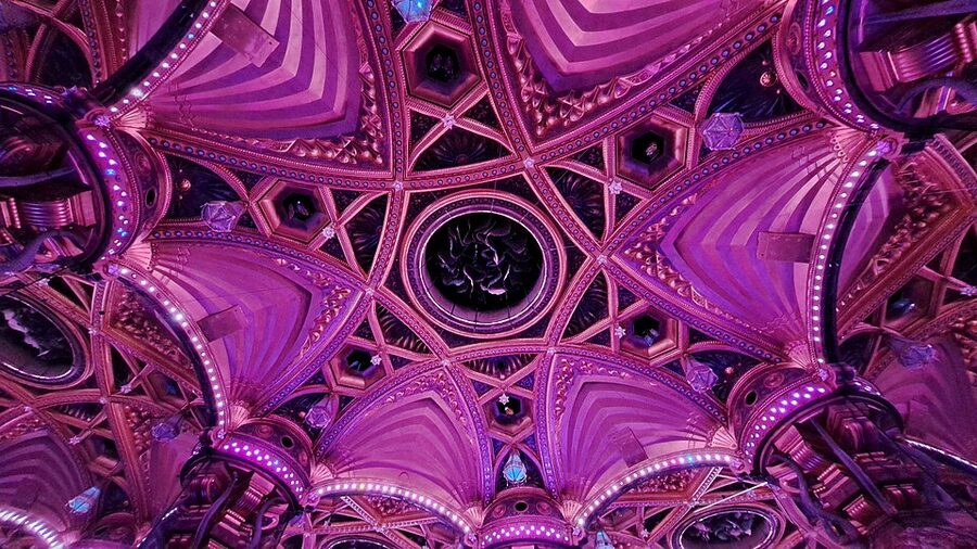 Purple-lit detail of the Palais des Mirages dome at Musee Grevin Paris