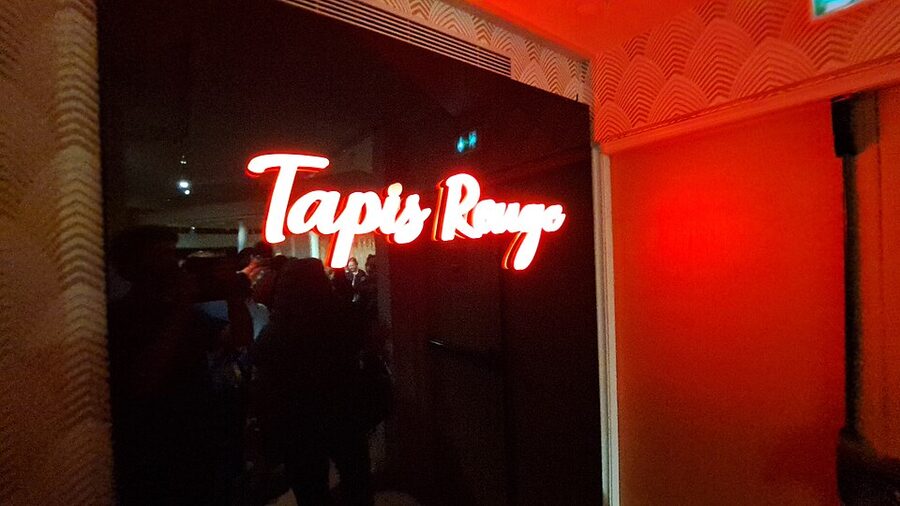 Tapis Rouge red carpet section neon sign at Musee Grevin Paris