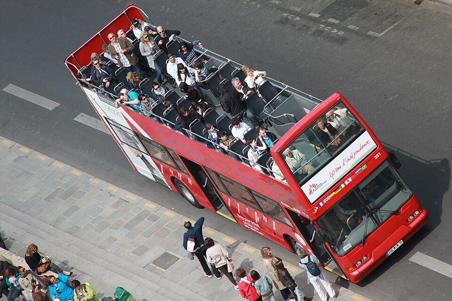 Hop-on hop-off bus near Notre Dame Cathedral Paris