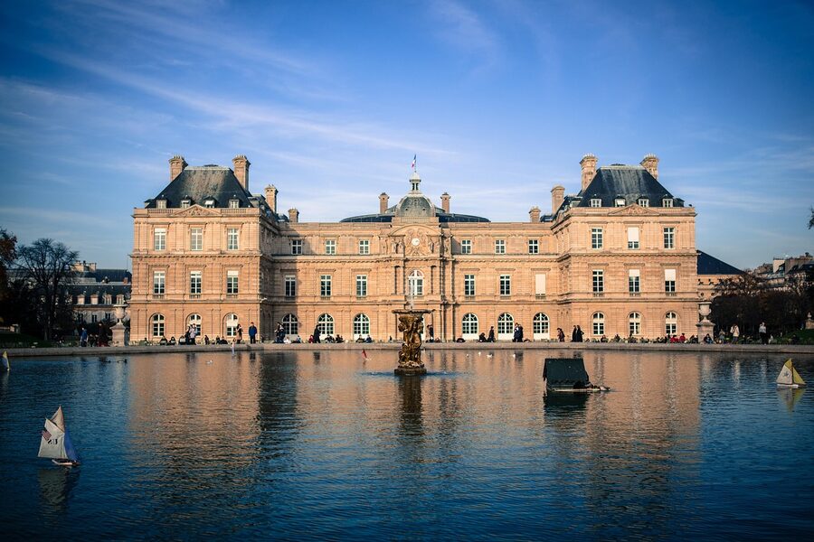 Luxembourg Garden fountain in Paris with palace beyond