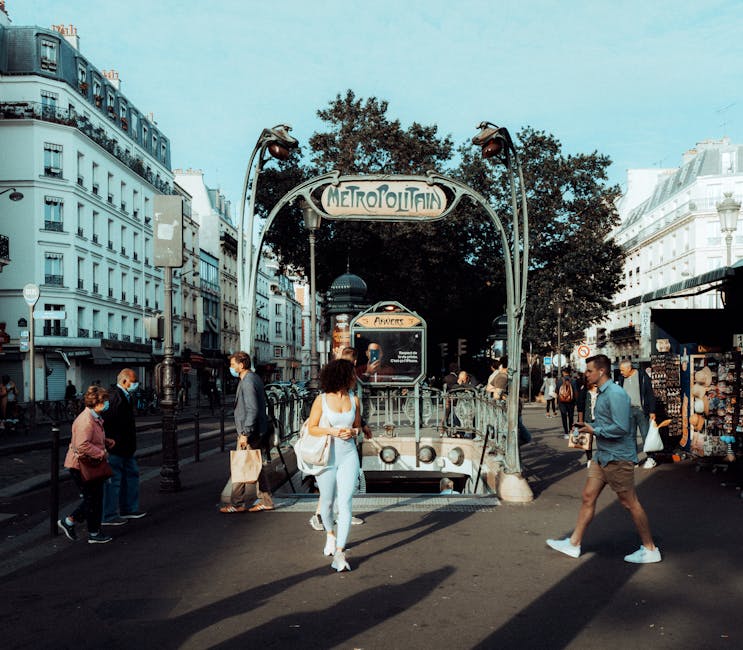 Paris Metro entrance street scene near Moulin Rouge