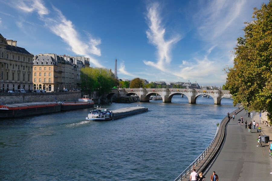 Paris Seine river scene with the Eiffel Tower framed by Haussmann architecture